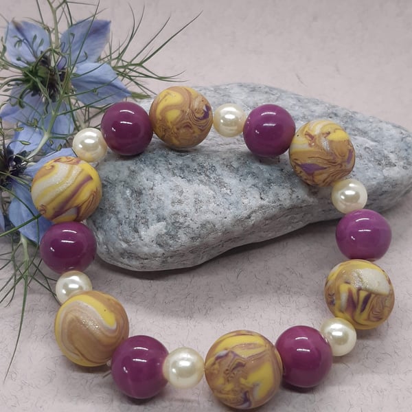 Pretty purple and yellow polymer clay bracelet