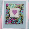 Hand-stitched heart card with cheerful Liberty tana lawn cotton background