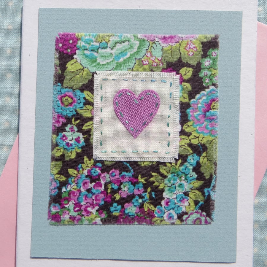 Hand-stitched heart card with cheerful Liberty tana lawn cotton background