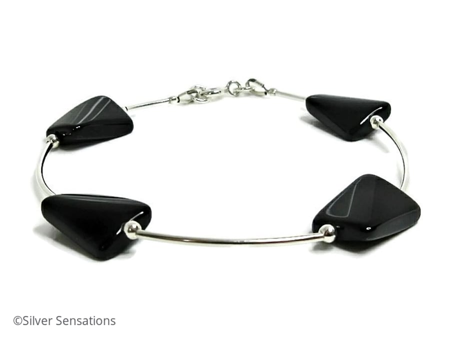 Glossy Twisted Black Onyx Oblongs Bangle Style Bracelet With Sterling Silver