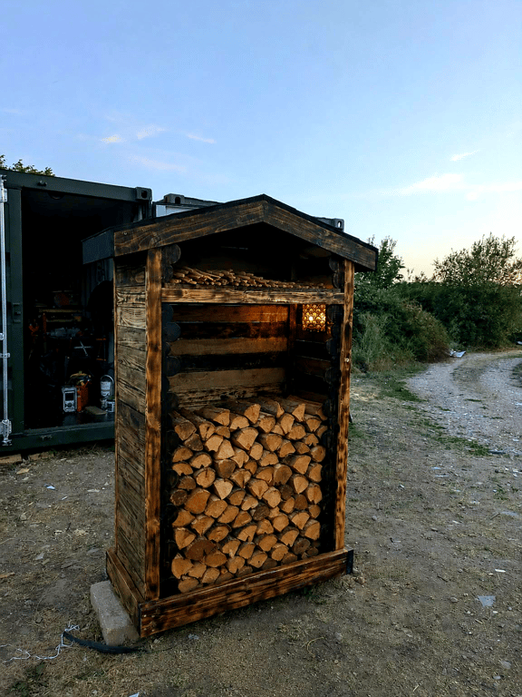  HANDCRAFTED BURNT TIMBER LOG STORE – A UNIQUE GARDEN FEATURE    