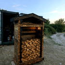  HANDCRAFTED BURNT TIMBER LOG STORE – A UNIQUE GARDEN FEATURE    
