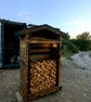  HANDCRAFTED BURNT TIMBER LOG STORE – A UNIQUE GARDEN FEATURE    