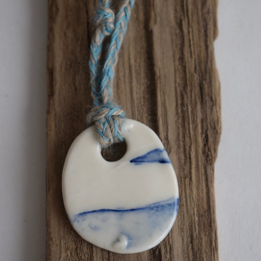 Porcelain Pebble Pendant with Bead and Linen Thread