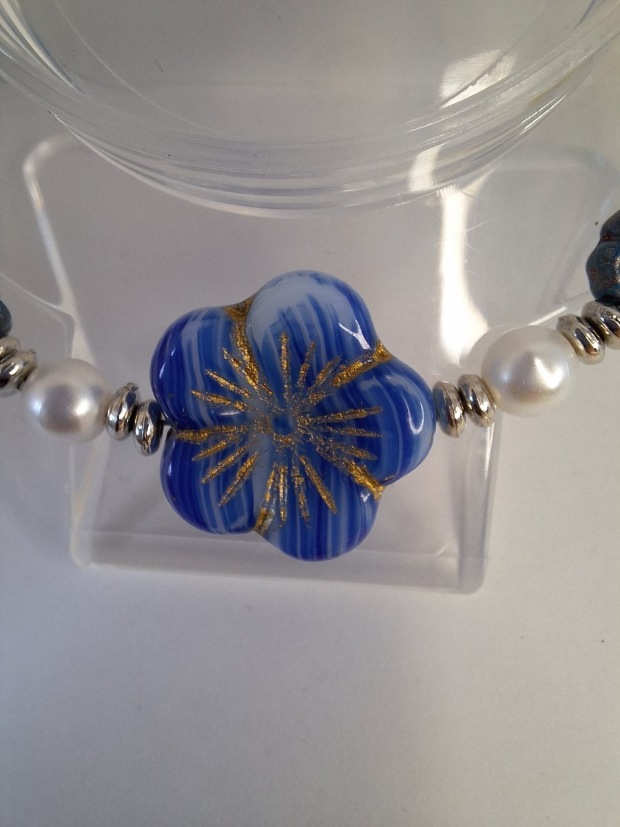 Beaded bracelet featuring beautiful blue Czech glass beads