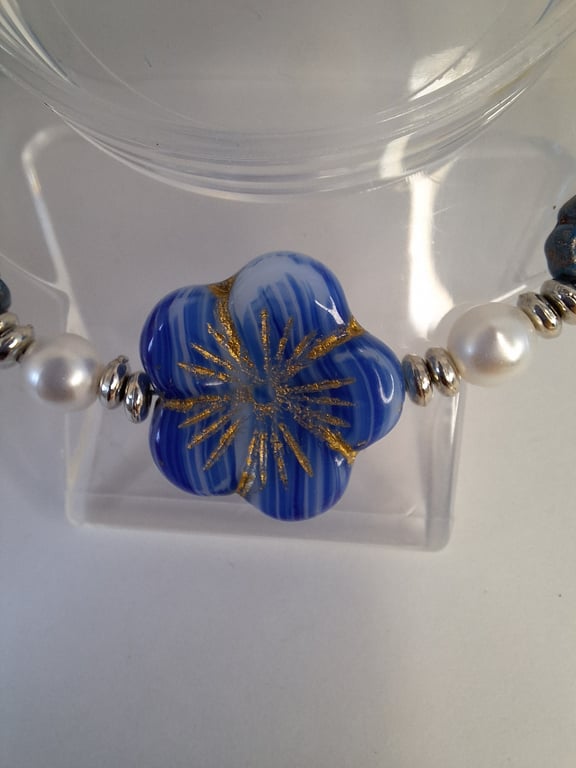 Beaded bracelet featuring beautiful blue Czech glass beads