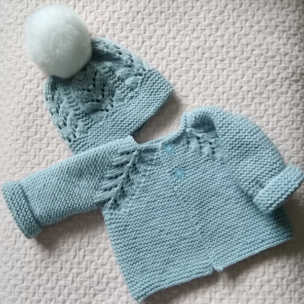 Hand knitted cardigan and hat set