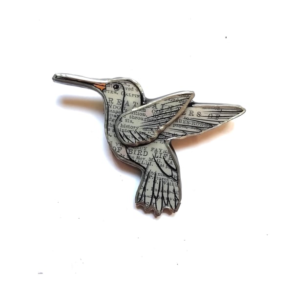 Wonderfully whimsical Newsprint Hummingbird Resin Brooch by EllyMental 