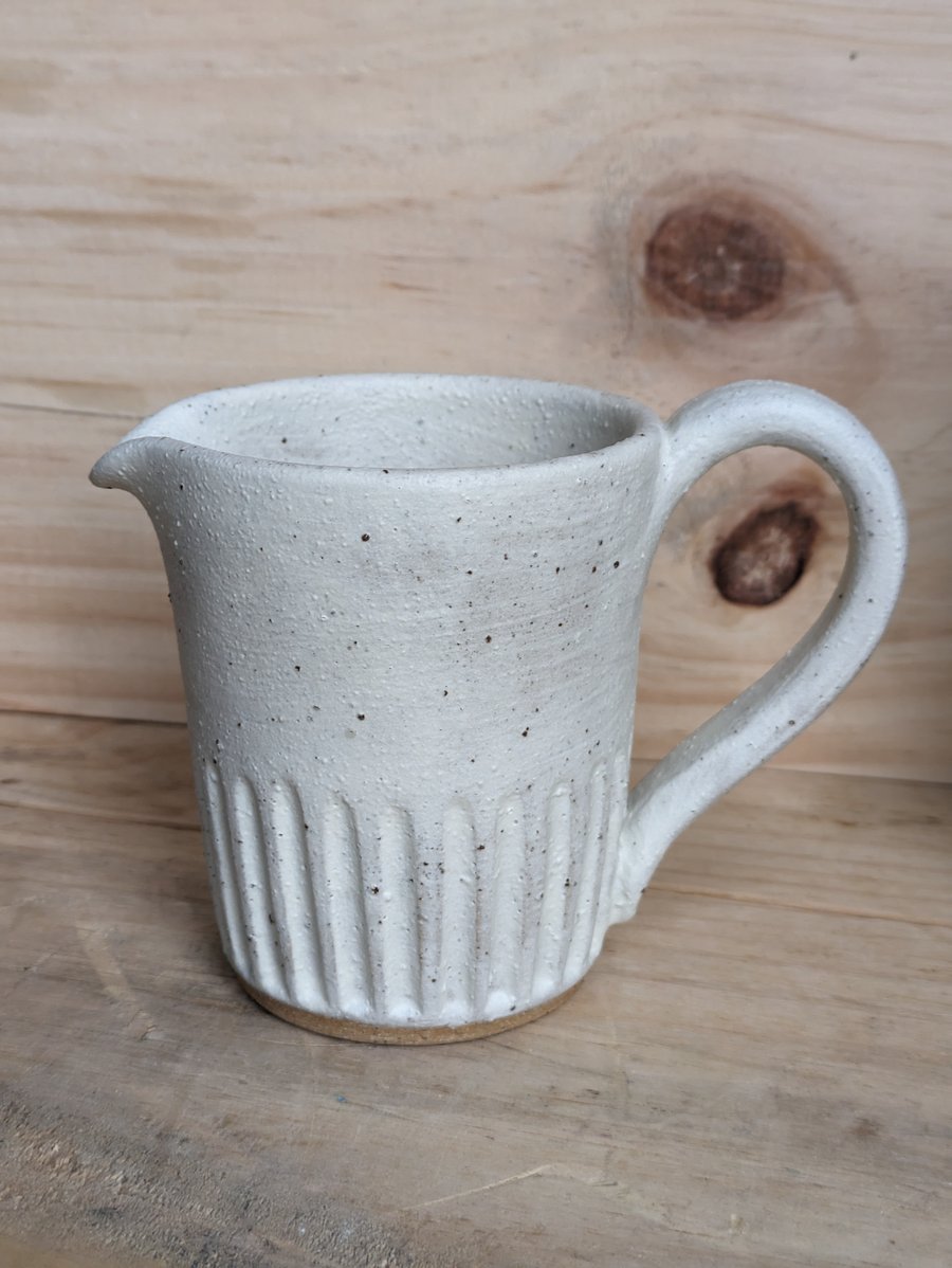 Matte cream carved jug (fully glazed)
