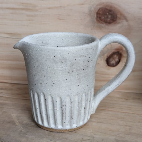 Matte cream carved jug (fully glazed)