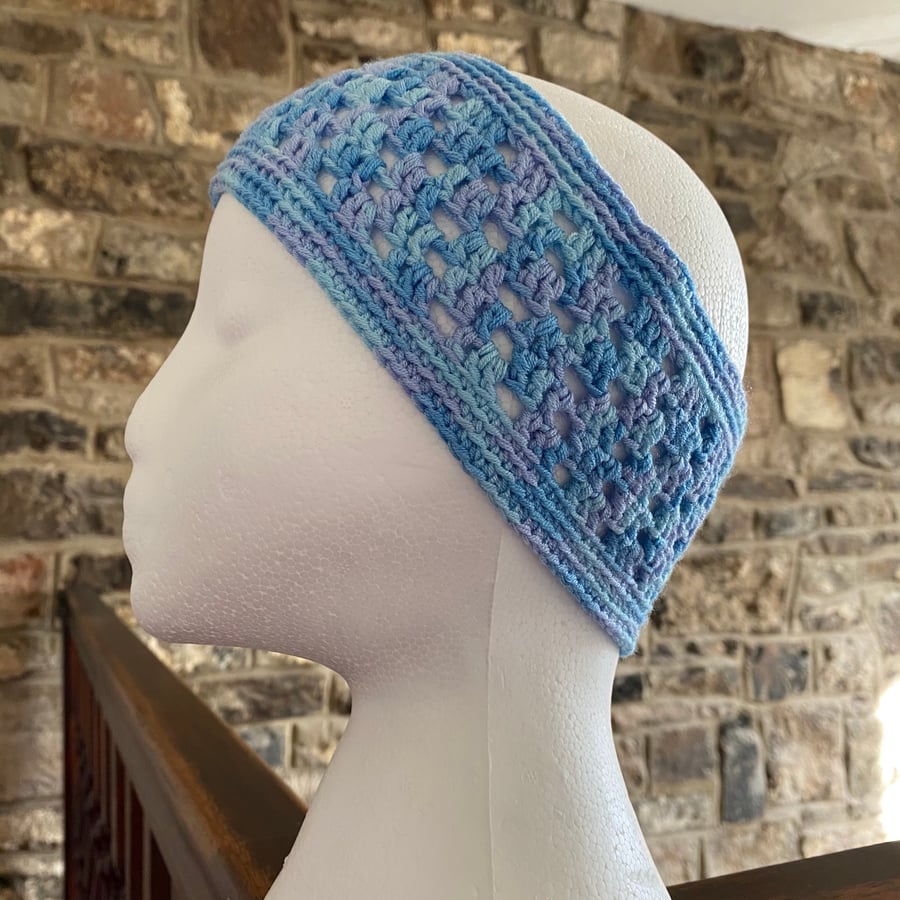 Women’s ear warmer in variegated blue acrylic yarn