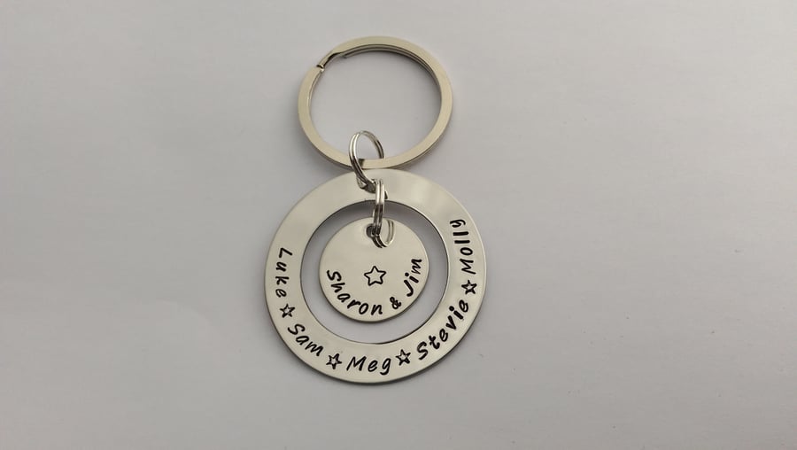 Hand Stamped personalised circle grandchildren children name birthdate keyring