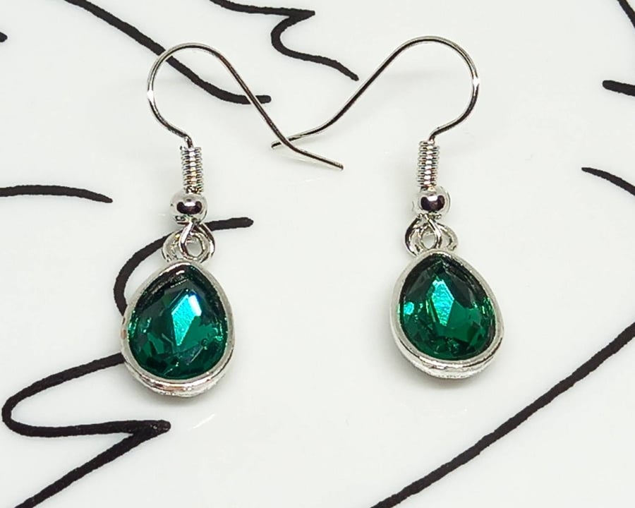 Tiny emerald green faceted glass teardrop earrings 