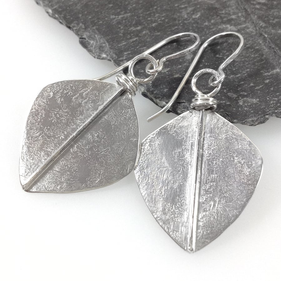 Large silver leaf spear earrings