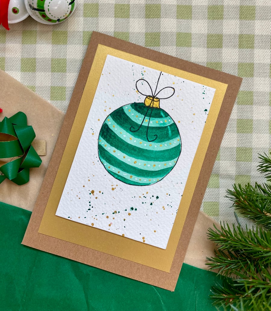 Card, hand painted original of a single Christmas bauble in green.