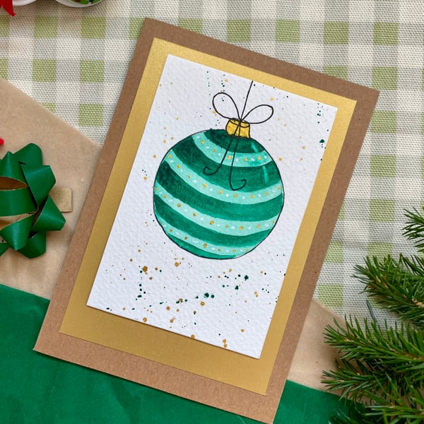 Card, hand painted original of a single Christmas bauble in green.