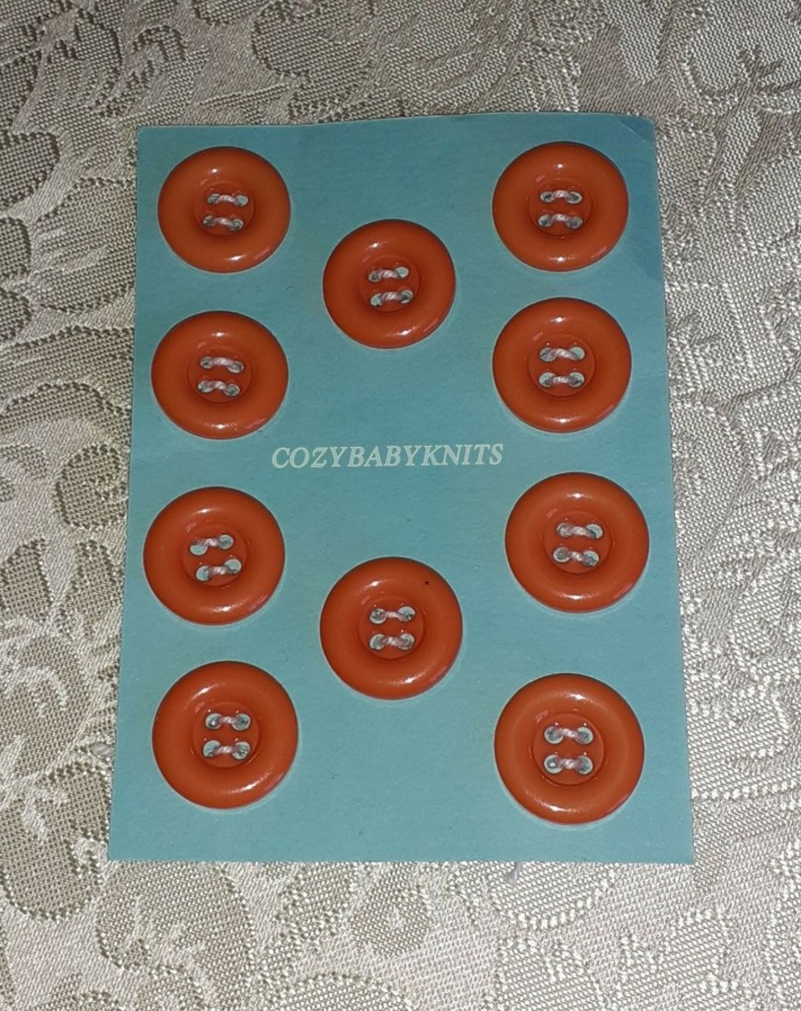 18MM ORANGE ROUND BUTTONS WITH FOUR HOLES FOR ATTACHING 