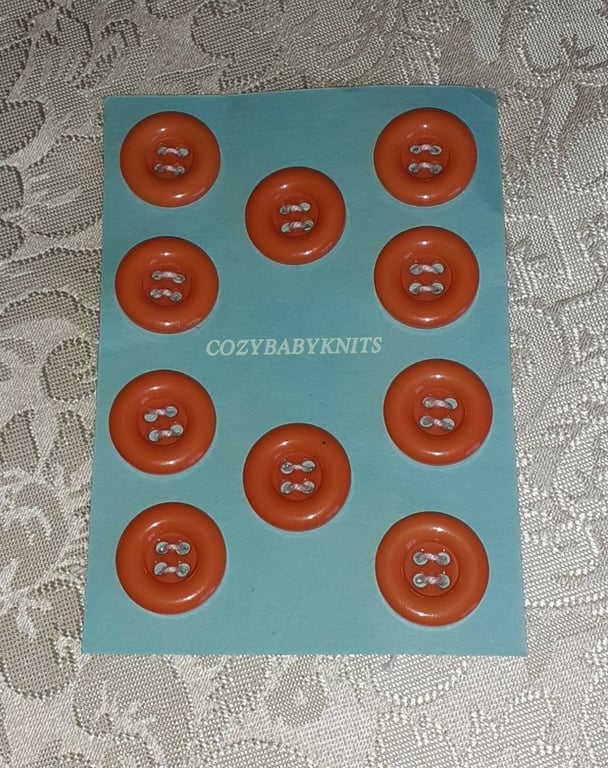 18MM ORANGE ROUND BUTTONS WITH FOUR HOLES FOR ATTACHING 