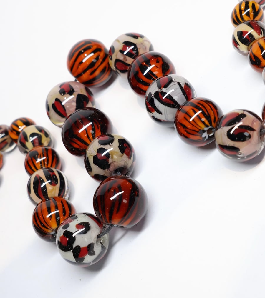 Handmade tiger and leopard patterned lamp work glass beads