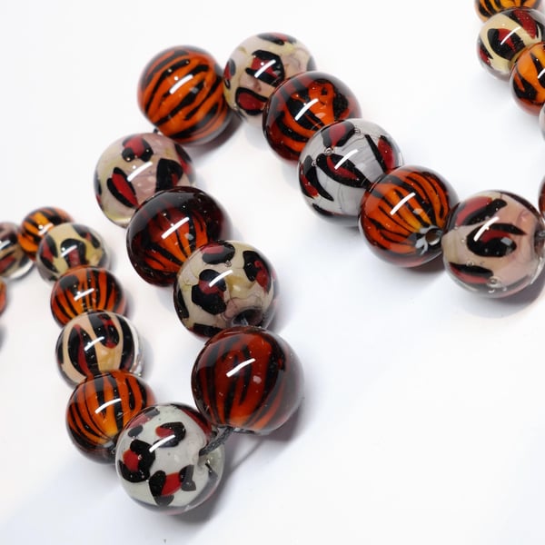 Handmade tiger and leopard patterned lamp work glass beads