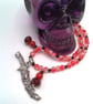 Silver Dagger Pendant on a Red Bead Necklace With Red and Black Bead Charms
