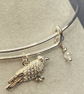 Silver plated bird charm bangle with white topaz stones - Image 3