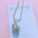 Starfish on sea glass pendant on necklace