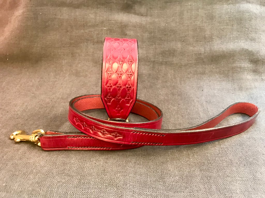 Embossed red dog collar and lead