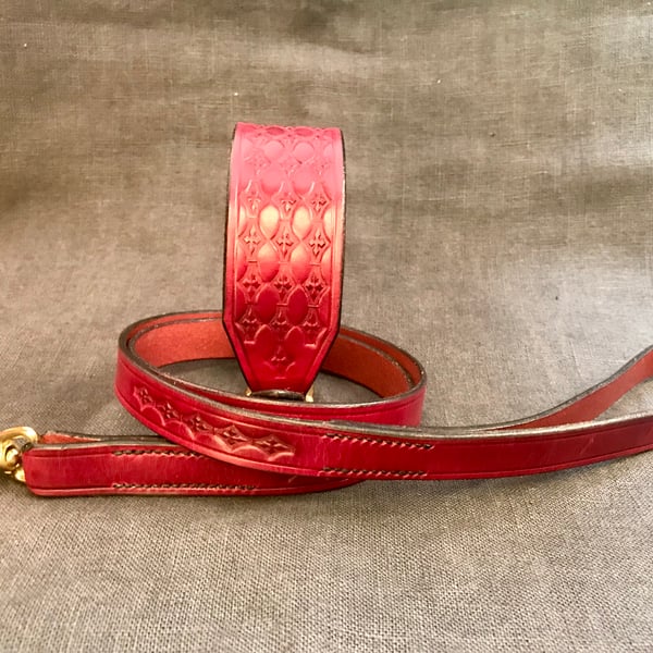 Embossed red dog collar and lead