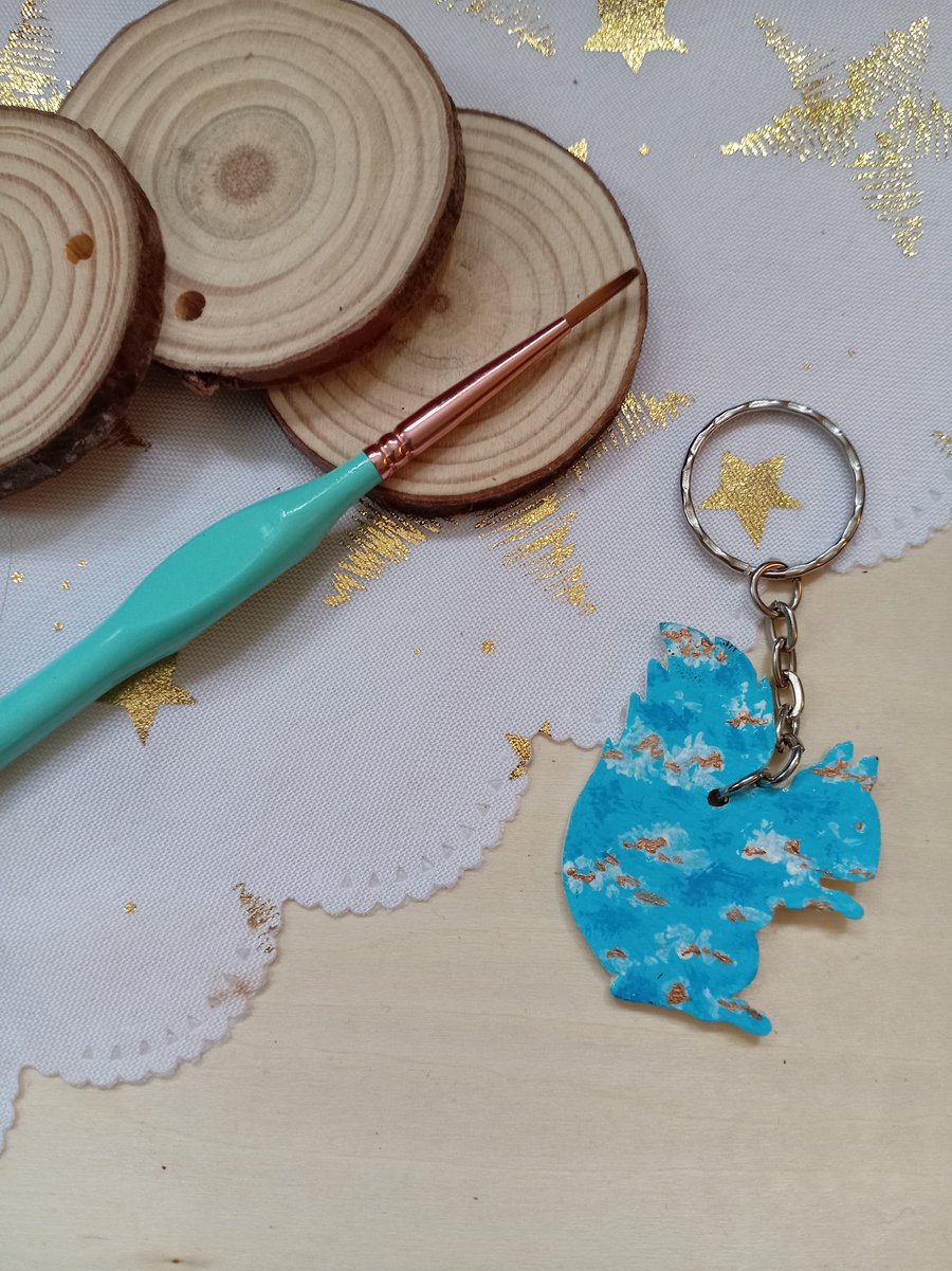 Wooden squirrel shaped sky patterned keyring 