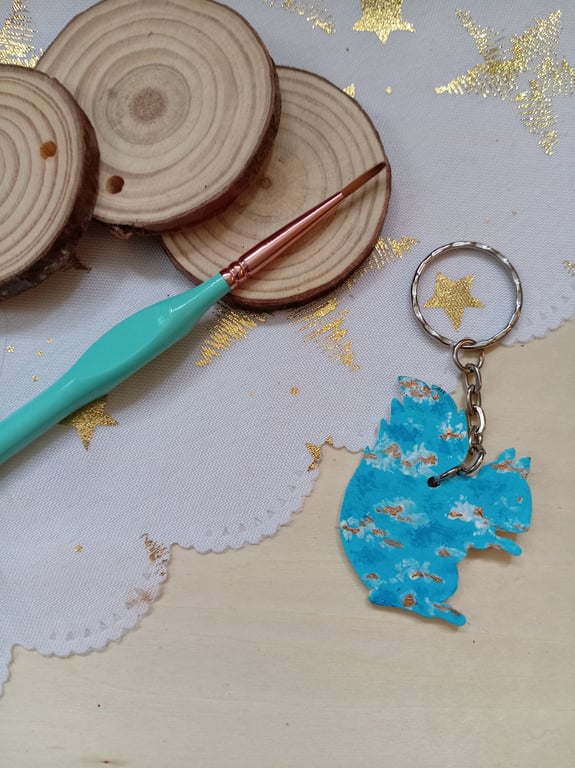 Wooden squirrel shaped sky patterned keyring 