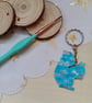 Wooden squirrel shaped sky patterned keyring  - Image 1