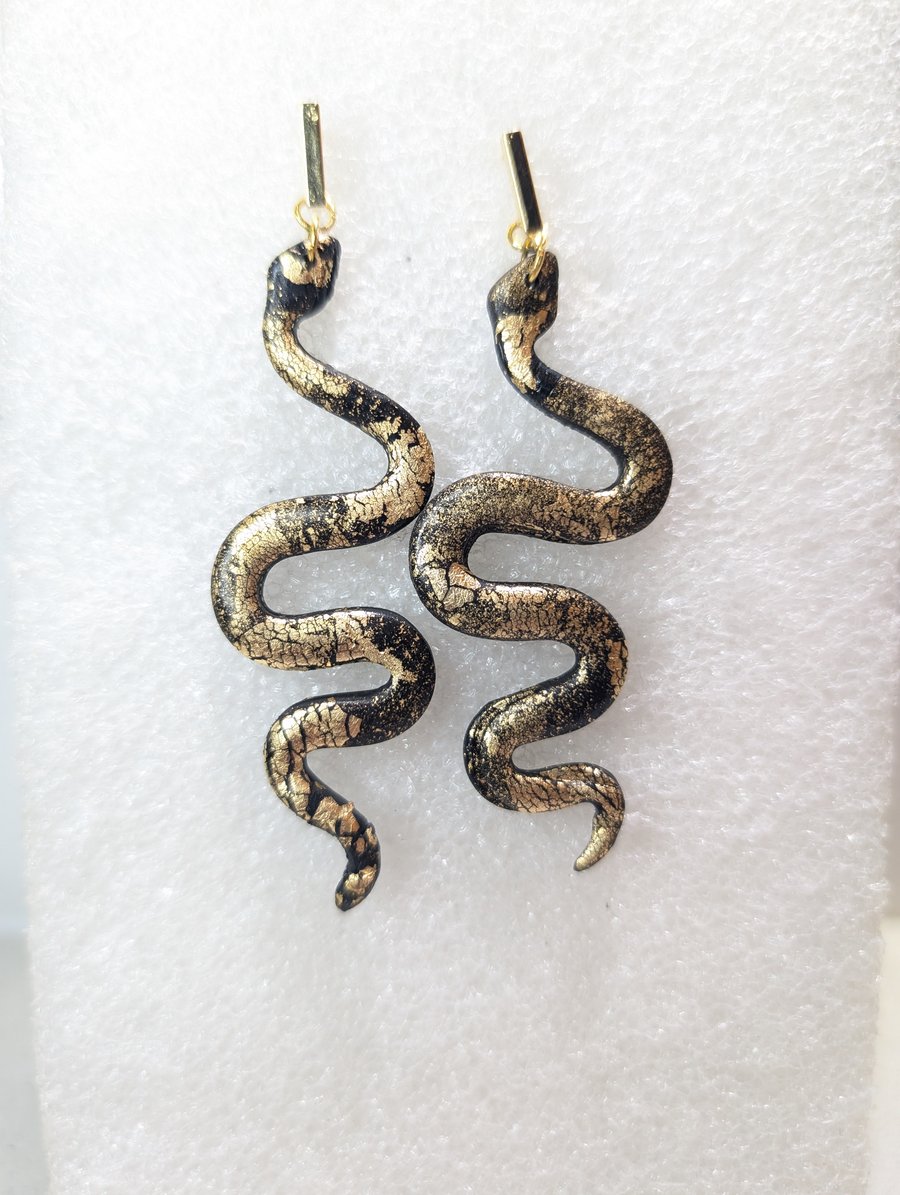 Black and gold snakes 2
