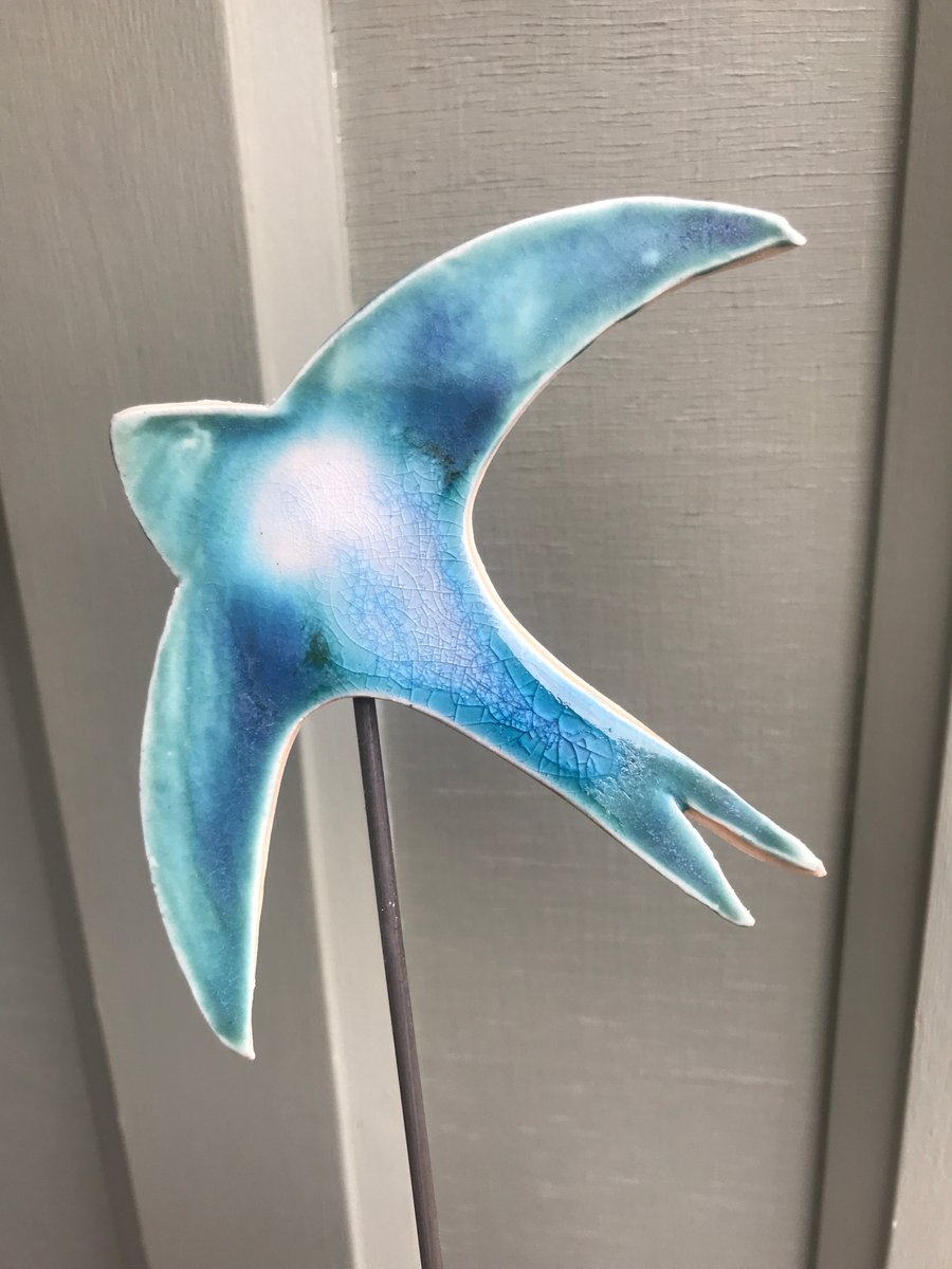 Single Swift  - A beautiful turquoise ceramic swift mounted on an oak block