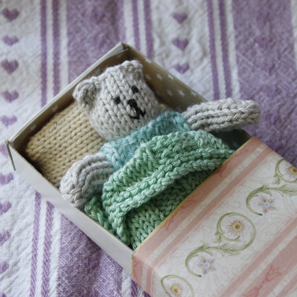 Knitted Ted in a Bed