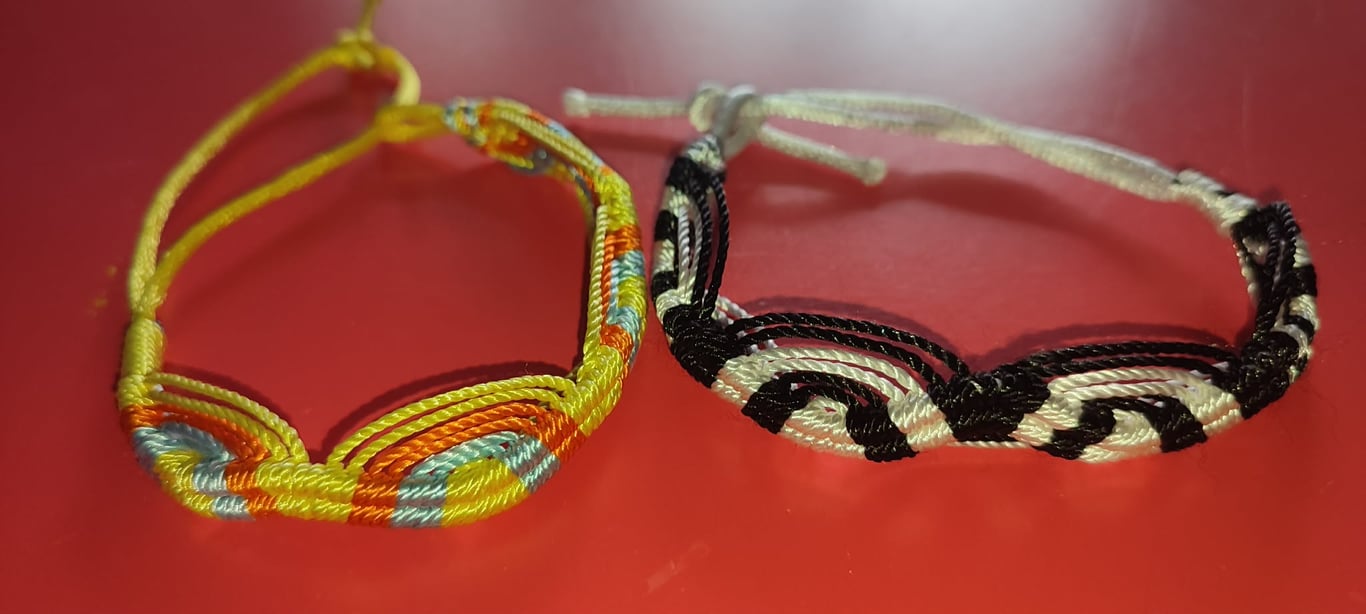 2 handmade beautiful  colourful friendship bracelets with tie closure