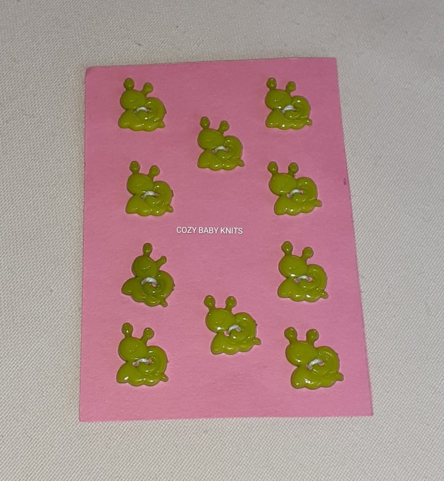 GREEN SNAIL SHAPE BUTTONS WITH TWO HOLES FOR ATTACHING 