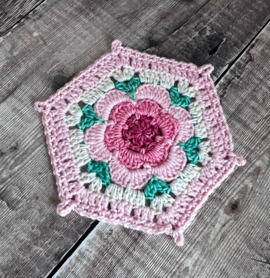Hand crocheting vintage style coaster doily