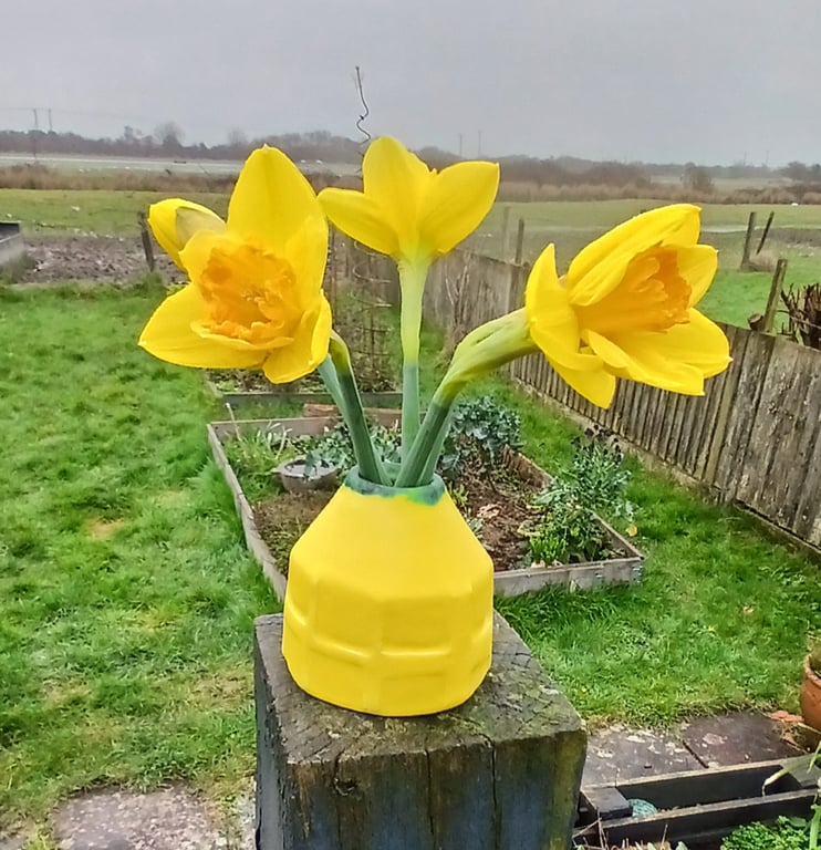 Small bright yellow bud vase 