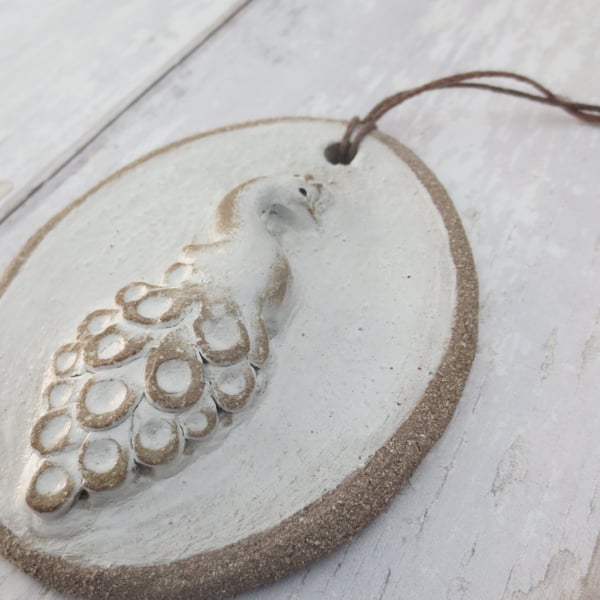 Hand-built stoneware small peacock wall plaque ornament in white