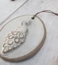 WALL DECORATION hand-built stoneware small peacock plaque ornament in white - Image 1