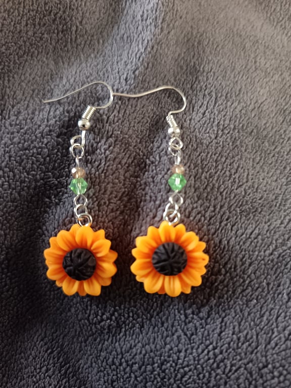 Sunflower charm dangle earrings with glass beads detail