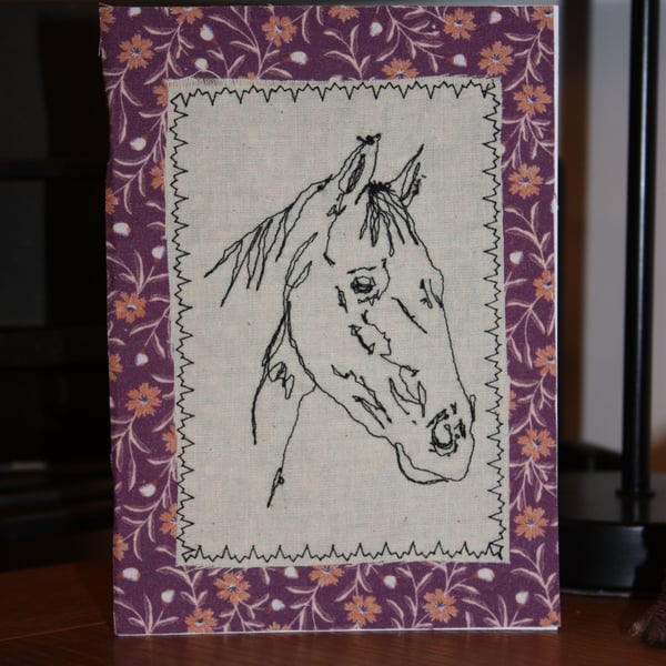 Horse head with a floral border
