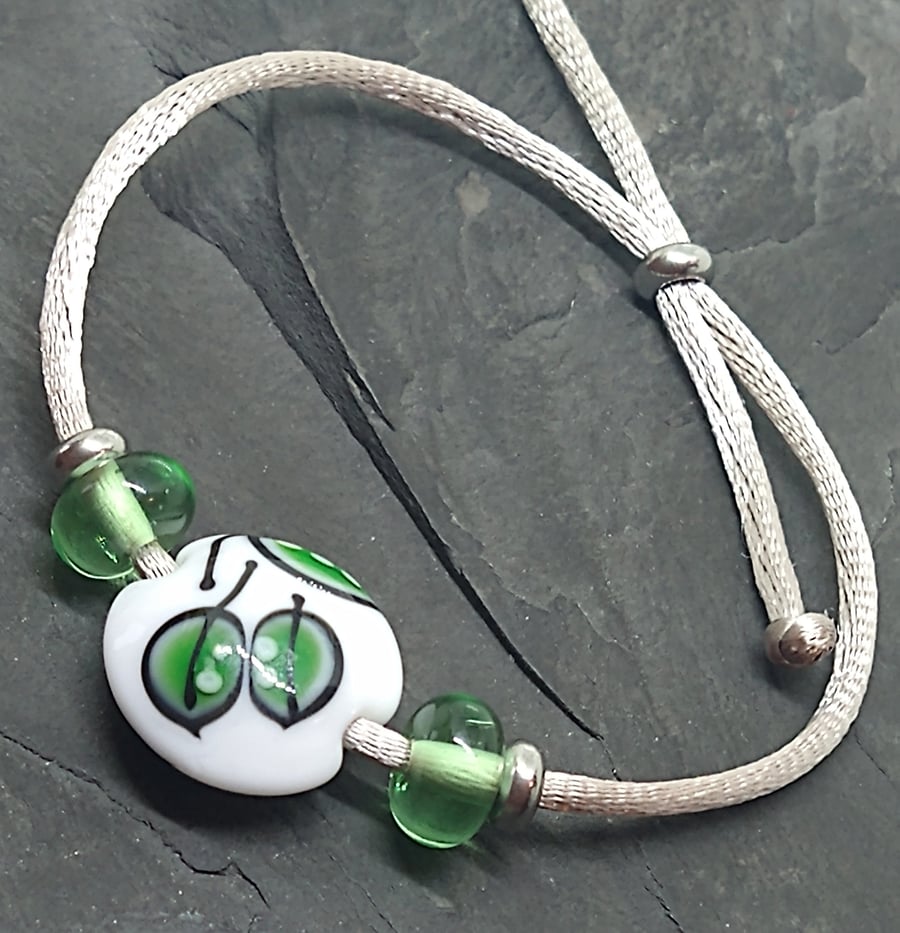 Turning leaf slider bracelet in white and rich green Lampwork Bracelet