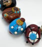 Handmade brown, ivory and turquoise patterned lamp work glass beads - Image 7