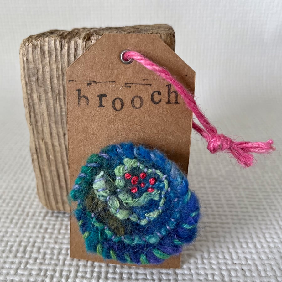 Needle felted hand embroidered circular brooch 