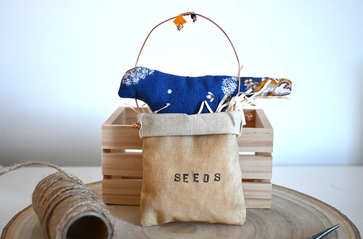 Primitive blue bird seed bag keepsake
