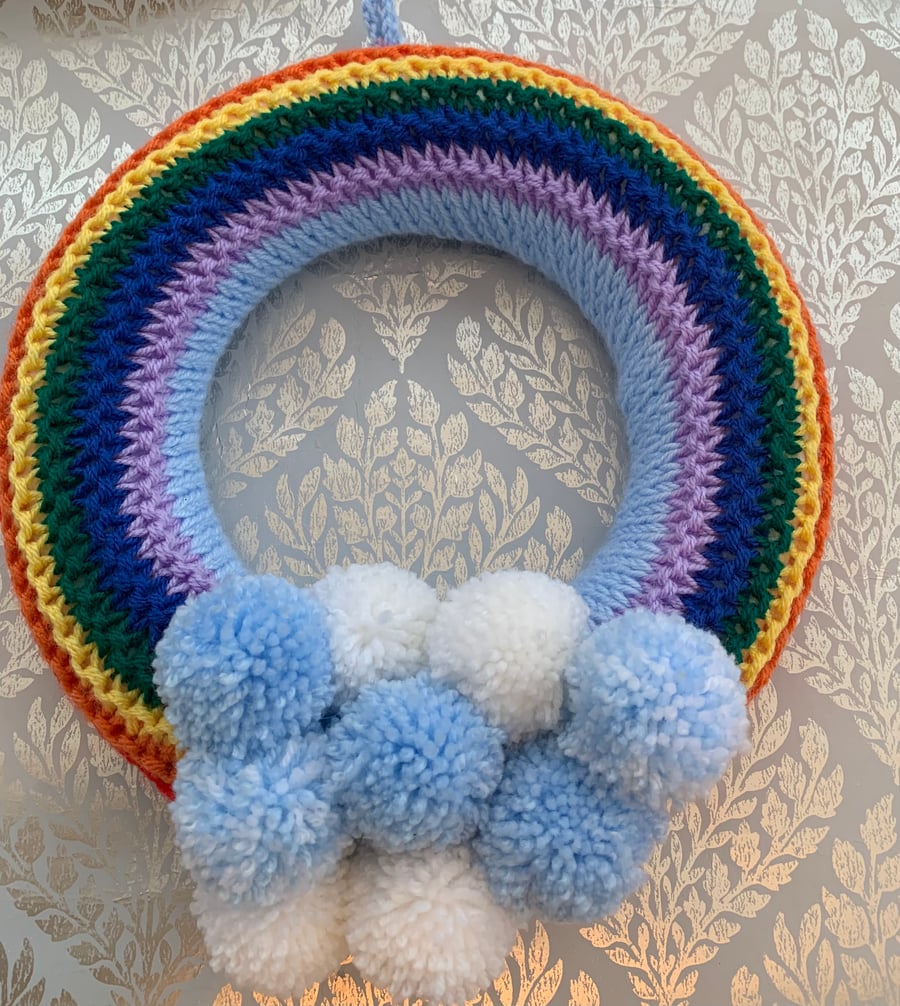 Pom pom wreath with rainbow 