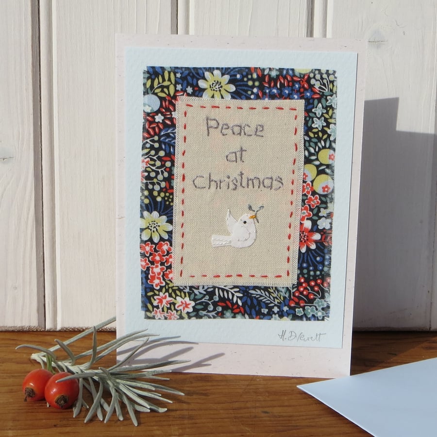 Peace at Christmas, hand-stitched text, dove, pretty Liberty background fabric