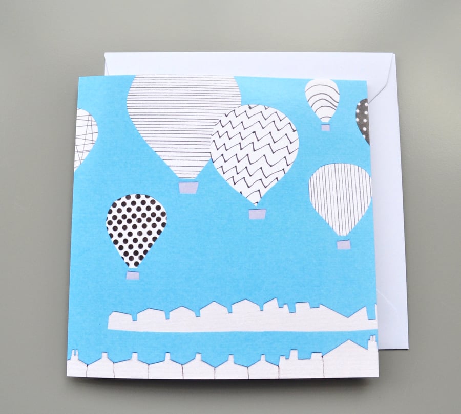 Monochrome Hot Air Balloons on Blue Background